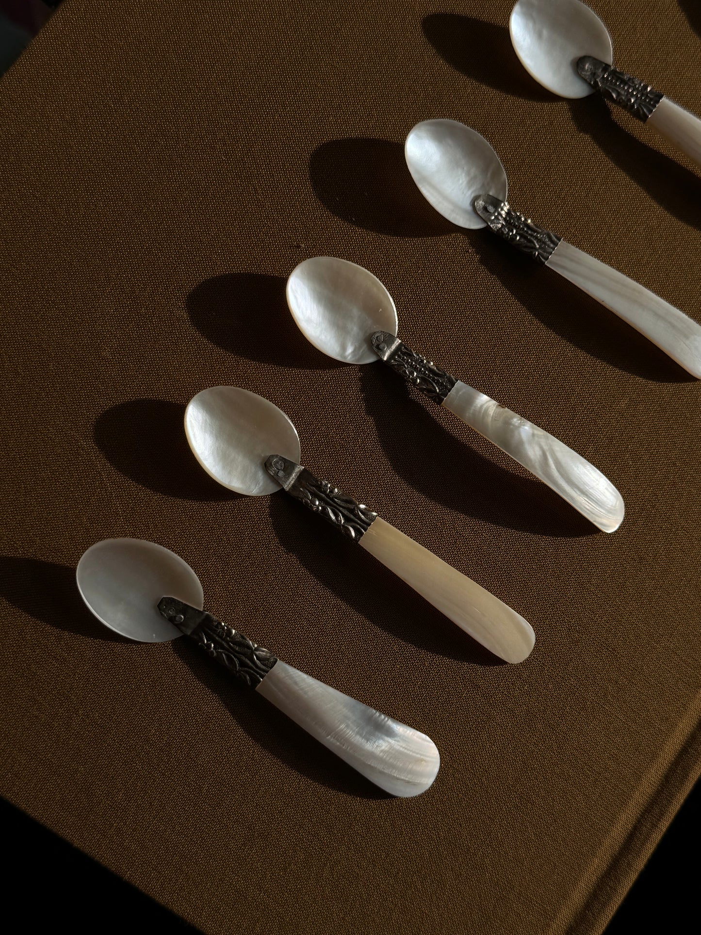 Set of six mother of pearl caviar spoons