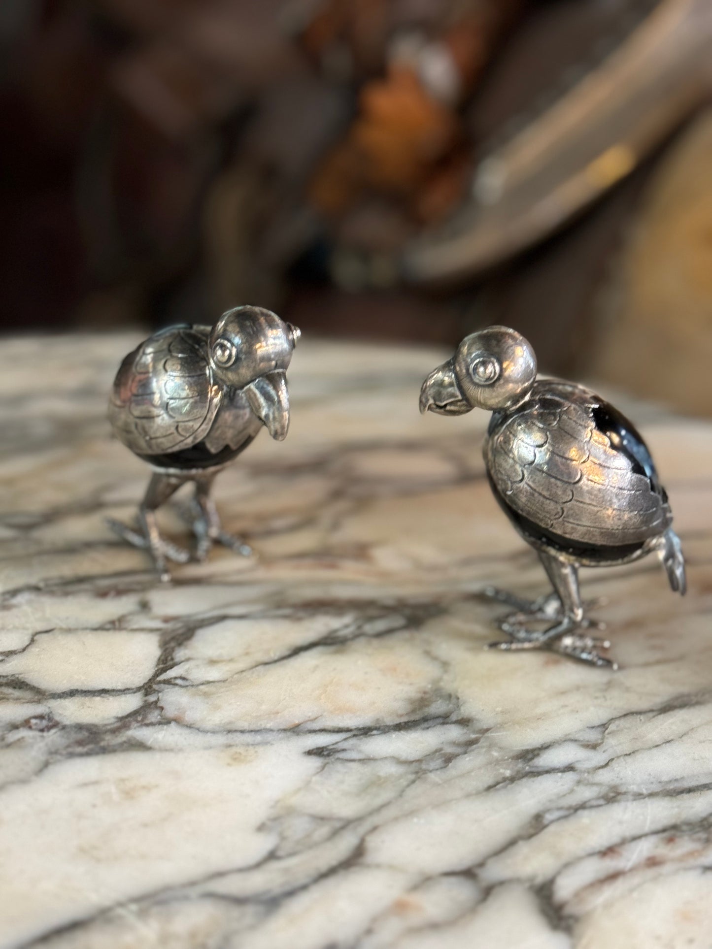 Pair of mid century Sterling silver and onyx birds